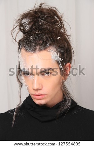 NEW YORK, NY- FEBRUARY 07: A model gets ready backstage at the Elliott Evan Collection \