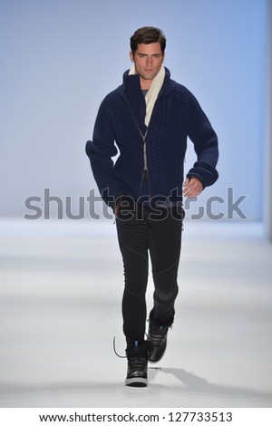 NEW YORK, NY - FEBRUARY 08: A model walks the runway at the Nautica Fall Winter 2013 fashion show during Mercedes-Benz Fashion Week on February 8, 2013, NYC.