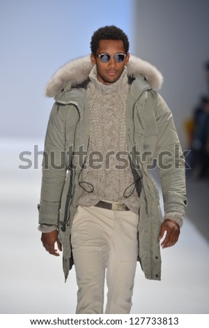 NEW YORK, NY - FEBRUARY 08: A model walks the runway at the Nautica Fall Winter 2013 fashion show during Mercedes-Benz Fashion Week on February 8, 2013, NYC.