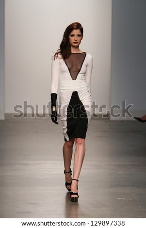 NEW YORK - FEBRUARY 13: A model walks the runway at the Studio 6th Sense  Fall Winter 2013 Collection during Nolcha Fashion Week on February 13, 2013 in New York City.