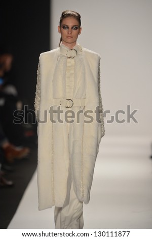 NEW YORK - FEBRUARY 08: A model walks the runway at the Academy of Art University Fall Winter 2013 Fashion Show during Mercedes-Benz Fashion Week on February 8, 2013 in New York City.
