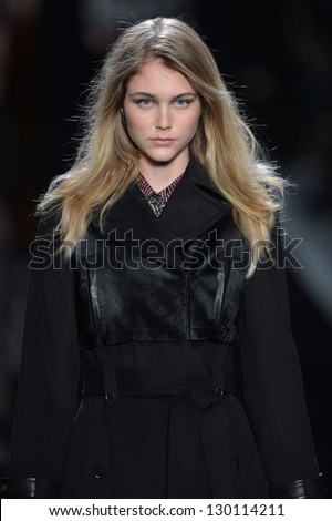 NEW YORK - FEBRUARY 08: A model walks the runway at the Nicole Miller Fall Winter 2013 Collection during Mercedes-Benz Fashion Week on February 8, 2013 in New York City.