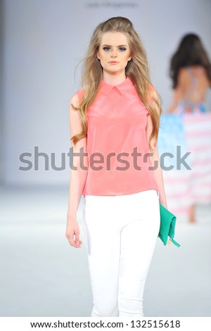 LOS ANGELES - MAR 12: A model walks the runway at the Brigade LA Fall 2013 fashion show during STYLE Fashion Week at Vibiana Cathedral on March 12, 2013 in Los Angeles, CA.