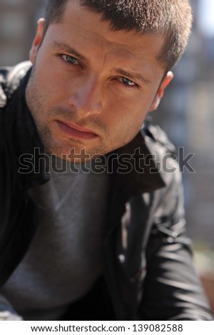 Male actor headshot showing action movie charackter