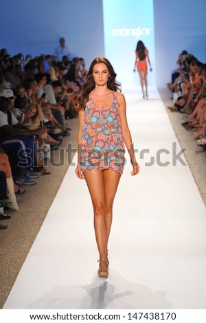 MIAMI - JULY 22: Model walking runway at the Manglar Collection for Spring/ Summer 2014 during Mercedes-Benz Swim Fashion Week on July 22, 2013 in Miami, FL
