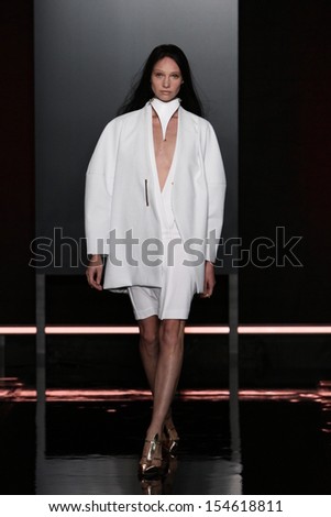 NEW YORK, NY - SEPTEMBER 06: A model walks the runway at the Sally LaPointe fashion show during Mercedes-Benz Fashion Week Spring 2014 at Highline Stages on September 6, 2013 in New York City.