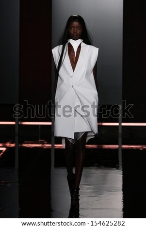 NEW YORK, NY - SEPTEMBER 06: A model walks the runway at the Sally LaPointe fashion show during Mercedes-Benz Fashion Week Spring 2014 at Highline Stages on September 6, 2013 in New York City.