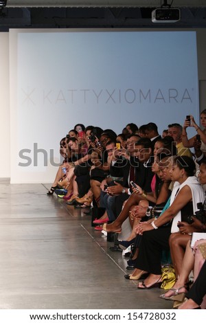 NEW YORK, NY - SEPTEMBER 11: Crowd at the runway show at the Katty Xiomara show during Nolcha Fashion Week New York Spring/Summer 2014 on September 11, 2013 in New York City.