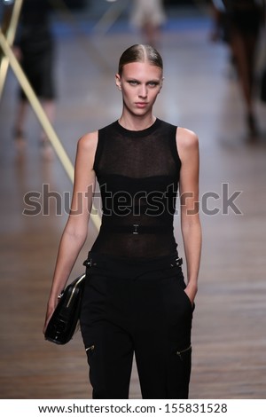 NEW YORK, NY - SEPTEMBER 06: A model walks the runway at the Jason Wu show during Spring 2014 Mercedes-Benz Fashion Week at 82 Mercer on September 6, 2013 in New York City.