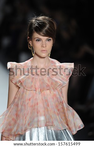 NEW YORK, NY - SEPTEMBER 06: A model walks the runway at the Zimmermann Spring 2014 fashion show during Mercedes-Benz Fashion Week at Lincoln Center on September 6, 2013 in New York City.