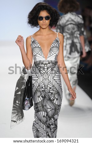NEW YORK, NY - SEPTEMBER 06: Model walks the runway at the Project Runway show during Spring 2014 Mercedes-Benz Fashion Week at The Theatre at Lincoln Center on September 6, 2013 in New York City