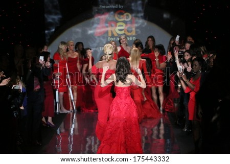 NEW YORK, NY - FEBRUARY 06: Celebrity models gather at the end of the runway at Go Red For Women - The Heart Truth Red Dress Collection 2014 Show on February 6, 2014 in New York City.