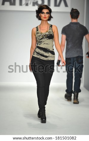 LOS ANGELES, CA - MARCH 11: A model walks runway at Artistix show during Style Fashion Week Fall 2014 at The Live Event Arena on March 11, 2014 in Los Angeles