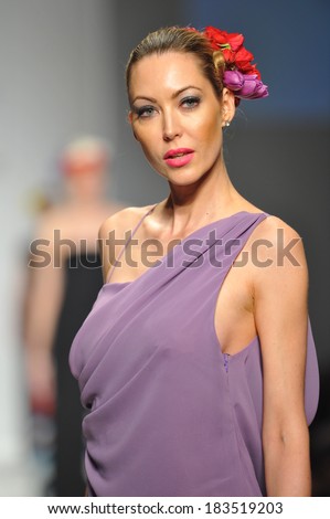 Los Angeles, CA - MARCH 11: A model walks the runway at Consort 62 show during Style Fashion Week Fall 2014 at The LA Live Event Deck on March 11, 2014 in LA