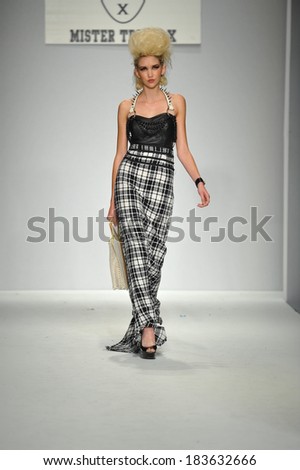 Los Angeles, CA - MARCH 11: A model walks the runway at Mister Triple X show during Style Fashion Week Fall 2014 at The LA Live Event Deck on March 11, 2014 in LA