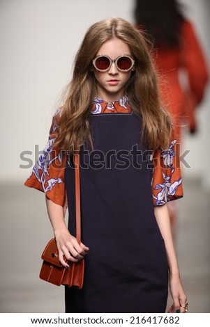 NEW YORK - SEPTEMBER 08: A model walks the runway at Karen Walker Spring-Summer 2015 fashion show during New York Fashion Week on September 08, 2014 in NYC.