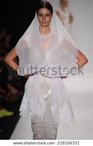 NEW YORK - SEPTEMBER 11: A model walks runway for Furne Amato Spring/Summer 2015 fashion show at Mercedes-Benz Fashion Week during New York Fashion Week on September 11, 2014 in NYC.