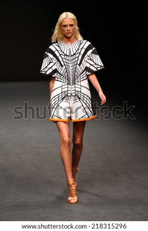 MILAN, ITALY - SEPTEMBER 17: A model walks the runway during the Byblos show as a part of Milan Fashion Week Womenswear Spring/Summer 2015 on September 17, 2014 in Milan, Italy.