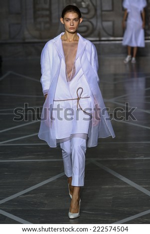 MILAN, ITALY - SEPTEMBER 20: A model walks the runway during the Mila Schon show as part of Milan Fashion Week Womenswear Spring-Summer 2015 on September 20, 2014 in Milan, Italy.