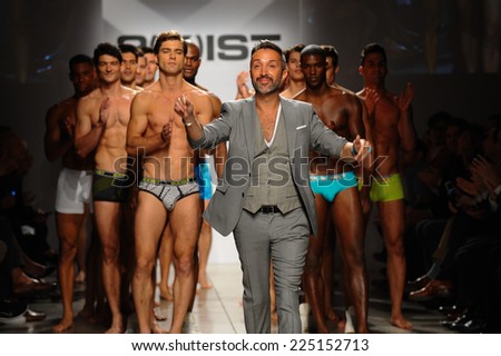 NEW YORK, NY - OCTOBER 21: 2(X)IST Creative Director Jason Scarlatti and models walk the runway during 2(X)IST Men\'s Spring/Summer 2015 Runway Show on October 21, 2014 in New York City.