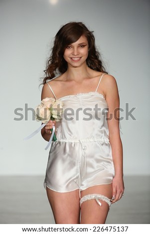 NEW YORK, NY - OCTOBER 25: A model walks runway during The Giving Bride Spring 2015 lingerie collection at the Center 548 on October 25, 2014 in New York City.