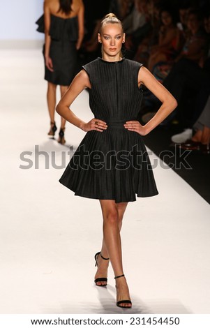 NEW YORK, NY - SEPTEMBER 05: A model walks the runway at the Project Runway (Kini Zamora) show during MBFW Spring 2015 at Lincoln Center on September 5, 2014 in NYC