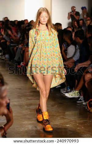 NEW YORK, NY - SEPTEMBER 10: A model walks the runway at the Jeremy Scott fashion show during MADE Fashion Week Spring 2015 at Milk Studios on September 10, 2014 in NYC.