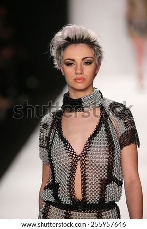 NEW YORK, NY - FEBRUARY 19: A model walks the runway in a Li Jon Sculptured Couture design at the Art Hearts Fashion show during MBFW Fall 2015 at Lincoln Center on February 19, 2015 in NYC
