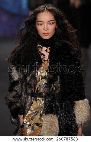 NEW YORK, NY - FEBRUARY 18: Model Fei Fei Sun walks the runway at the Anna Sui fashion show during MBFW Fall 2015 at Lincoln Center on February 18, 2015 in NYC