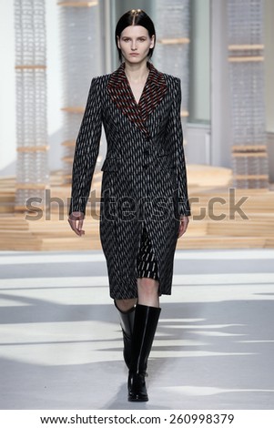 NEW YORK, NY - FEBRUARY 18: A model walks the runway at the Boss Womens fashion show during Mercedes-Benz Fashion Week Fall on February 18, 2015 in NYC.
