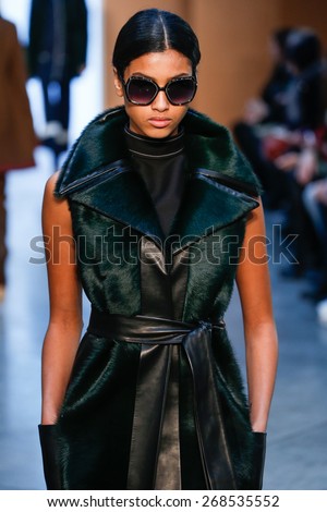 NEW YORK, NY - FEBRUARY 15: Model Imaan Hammam walk the runway at the Derek Lam Fashion Show during MBFW Fall 2015 at Pace Gallery on February 15, 2015 in NYC