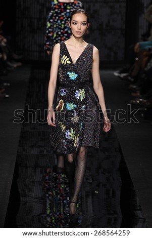 NEW YORK, NY - FEBRUARY 15: Model  Fei Fei Sun walk the runway at the Diane Von Furstenberg fashion show during MBFW Fall 2015 at Spring Studios on February 15, 2015 in NYC