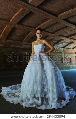NEW YORK - June 13: Model Kalyn Hemphill pose under the bridge at the Irina Shabayeva SS 2016 Bridal collection photoshoot on June 13, 2015 in New York, USA