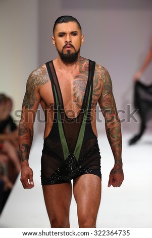 NEW YORK, NY - SEPTEMBER 12: Porn star extraordinaire Boomer Banks walks the runway at the Marco Marco fashion show during SS 2016 NYFW at Gotham Hall on September 12, 2015 in NYC,