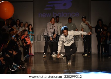 NEW YORK, NY - OCTOBER 17: Dancers perform on runway at New Balance Fall/Winter 2016 Runway Dance Party during petiteParade at The Spring Studio on October 17, 2015 in NYC.