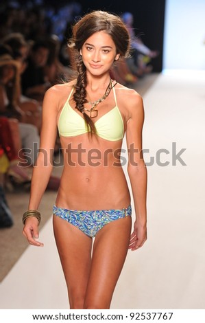 MIAMI - JULY 14: Model walks runway at the L Space Swimsuit Collection for Spring/ Summer 2012 during Mercedes-Benz Swim Fashion Week on July 14, 2011 in Miami, FL
