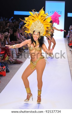 MIAMI - JULY 14: Brazilian dancer walks runway at the L Space Swimsuit Collection for Spring/ Summer 2012 during Mercedes-Benz Swim Fashion Week on July 14, 2011 in Miami, FL