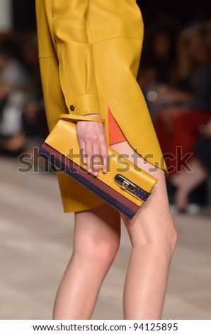 NEW YORK, NY - SEPTEMBER 11: A model wears Tommy Hilfiger Spring 2012 Women's Collection on the runway at The Theater at Lincoln Center on September 11, 2011 in New York City.