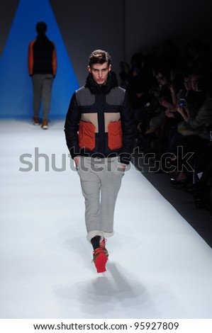 NEW YORK - FEBRUARY 10: Male model walks runway for General Idea Fall/Winter 2012 presentation in Lincoln Center during New York Fashion Week on February 10, 2012 in NYC.