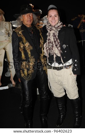 MOSCOW - OCTOBER 22: Hollywood party-goer James Goldstein (L) poses at the MHPI young designers presentation for Spring/ Summer 2012 during MBFW on October 22, 2011 in Moscow, Russia