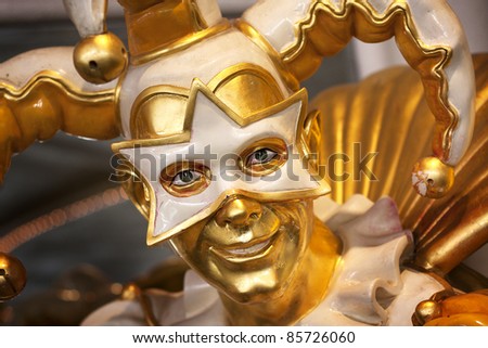 LAS VEGAS, NEVADA - SEPTEMBER 28: A masked jester welcomes guests at Harrahs Las Vegas Casino on Sept. 30, 2011 in Las Vegas, Nevada. Harrahs boasts over 2,500 rooms and 86,000 square feet of casino space.