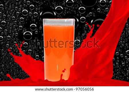 Red juice on black background