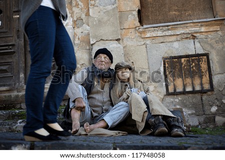 Abandoned people on the street are asking for money