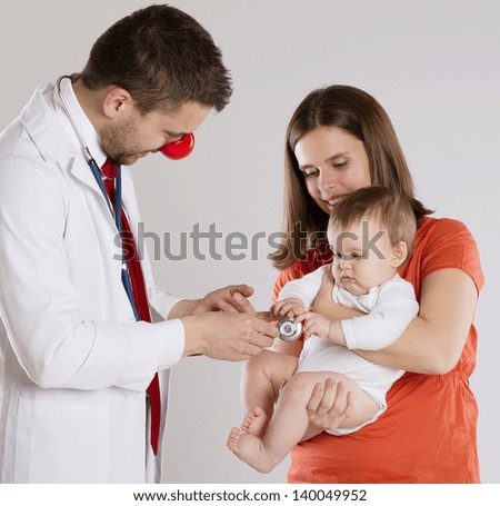 Mother with baby are having a medical visit at pediatrician doctor