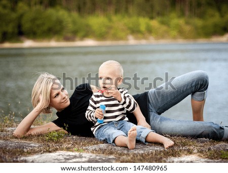 Family time by the lake in summer time