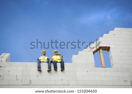 Construction Contractors building a big new home