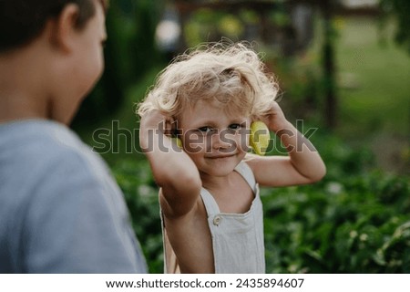 Similar – Image, Stock Photo Child holding green pepper