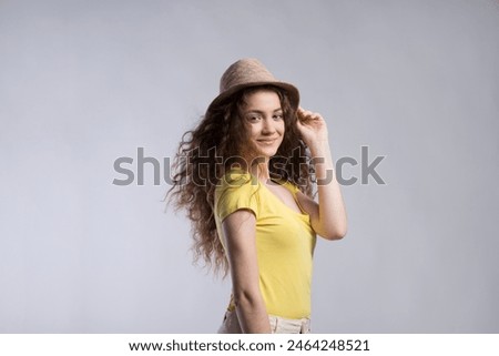 Similar – Image, Stock Photo Gorgeous teenager girl in a straw hat smiling. Portrait. Close-up Summer travel. Sale