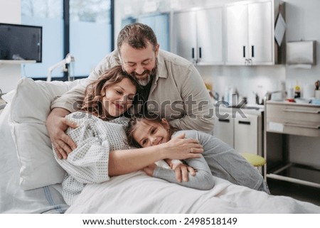 Image, Stock Photo Husband and daughter visiting senior woman in hospital