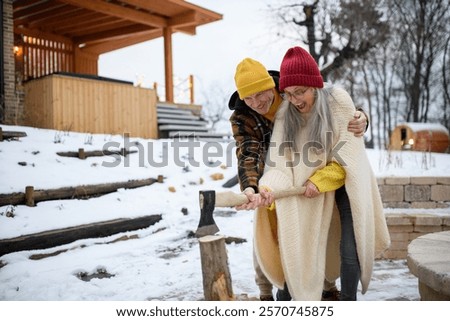 Similar – Image, Stock Photo Senior man cutting logs, working in the garden